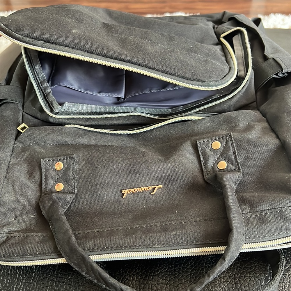 Large, black, multi pocketed backpack - Picture 3 of 5